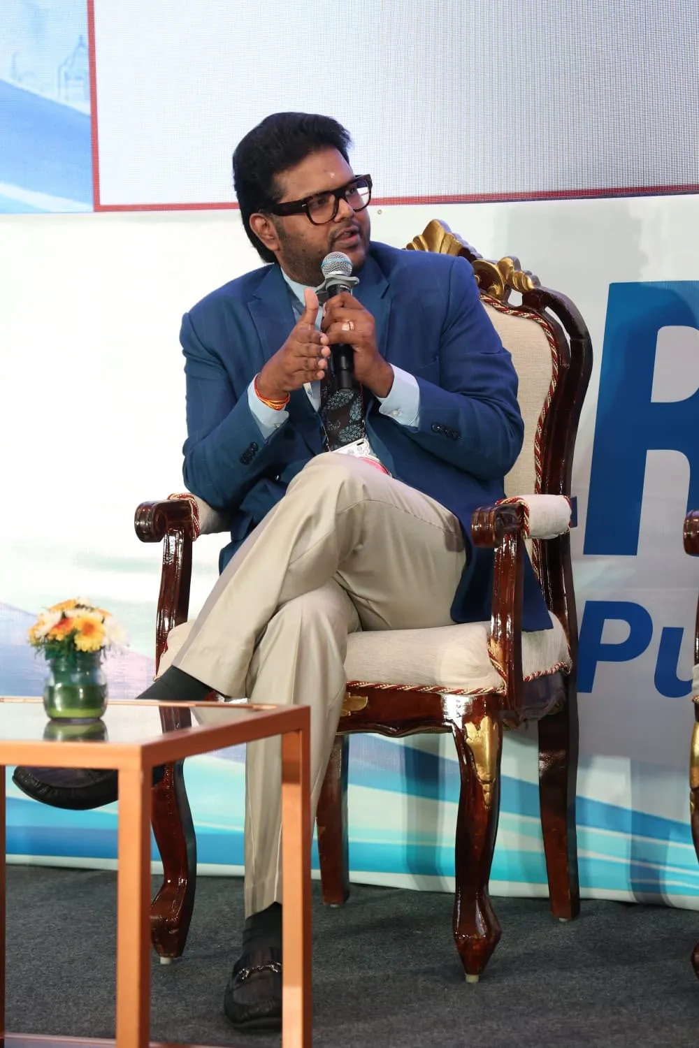 Dr. Koushik speaking during a panel discussion